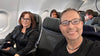 Guy Bavli and his wife relaxing on a plane with the Mat-Trix Travel Mat.